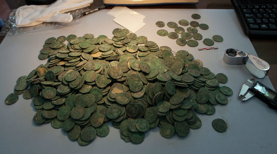 The Coins Being Examined By Museum Personnel