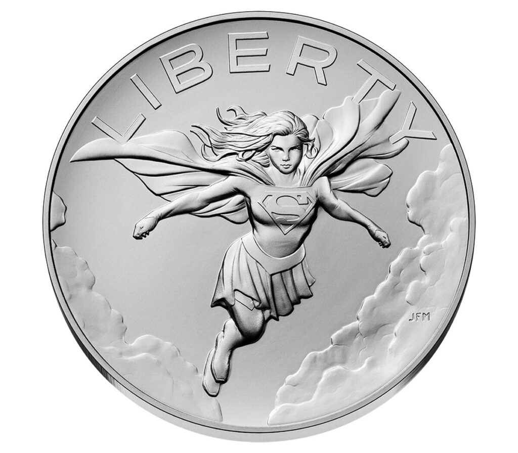 Supergirl Comic Art one ounce silver medal obverse showing Supergirl flying above clouds with her cape billowing and the inscription LIBERTY