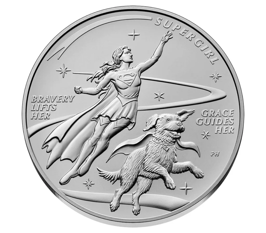 Supergirl Comic Art silver medal reverse showing Supergirl and Krypto the dog against a starburst with the inscriptions SUPERGIRL, BRAVERY LIFTS HER and GRACE GUIDES HER