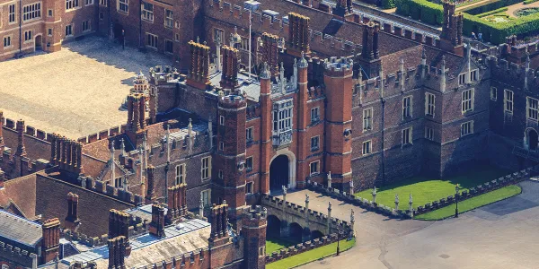 The ten stone King's Beasts on the Moat Bridge at the entrance to Hampton Court Palace