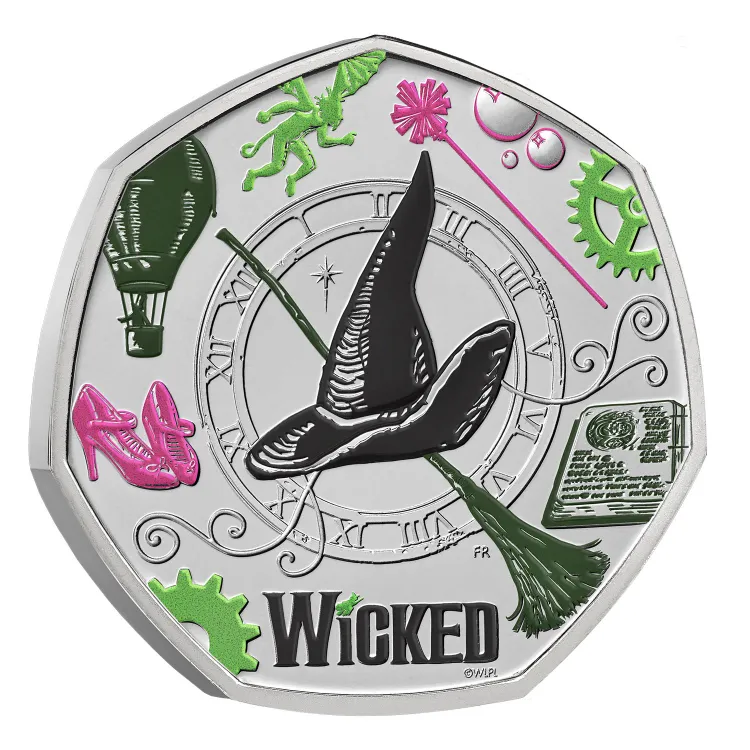 Wicked 2026 UK 50p reverse showing Elphaba's hat and broomstick as clock hands on a Roman numeral dial, surrounded by Oz icons in green and pink.