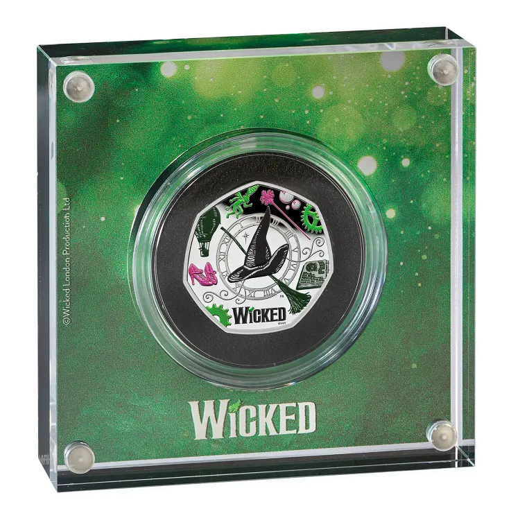 Wicked 2026 UK 50p Silver Proof Colour Coin mounted in its green acrylic display block, obverse of the block facing the viewer.