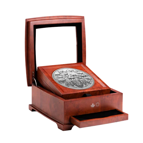 5 kg Animals of Canada silver coin displayed in its open wooden presentation case